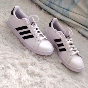 Men's adidas, size 11, mostly with white with a little black on them